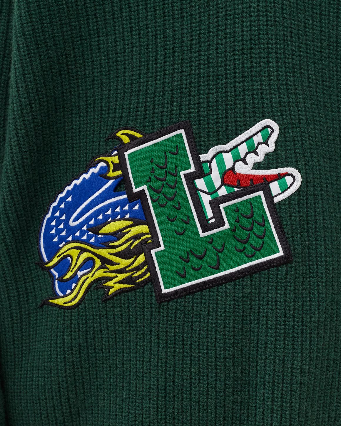 LACOSTE
Comic Logo patch sweater